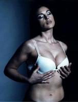 Monica Bellucci holding her tits